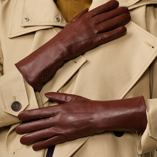 Extra-long brown leather gloves with rabbit-fur lining at the cuffs