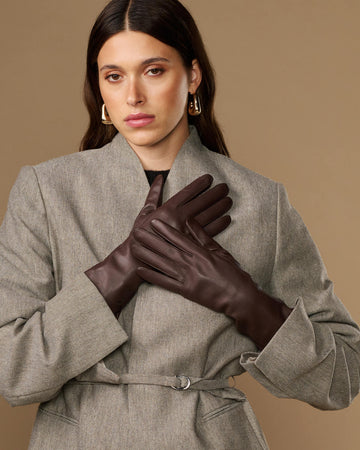 Long dark brown leather gloves with smooth, fitted design