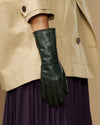 Dark green leather long glove with extended cuff and shaped finger panels