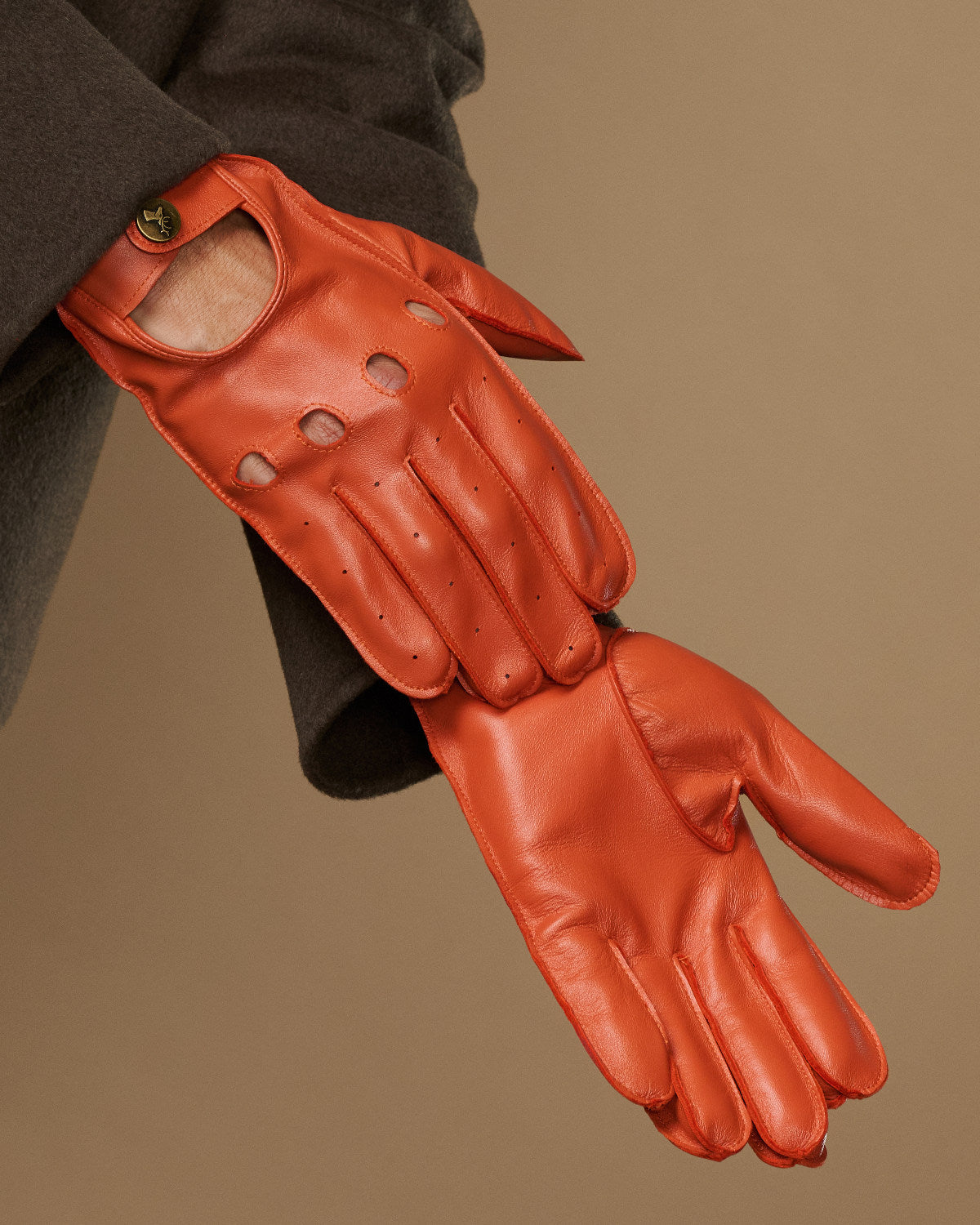 Orange leather touchscreen driving glove, single-hand palm and finger detail