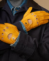 Men's yellow lambskin driving gloves, cuff and back detail with perforations