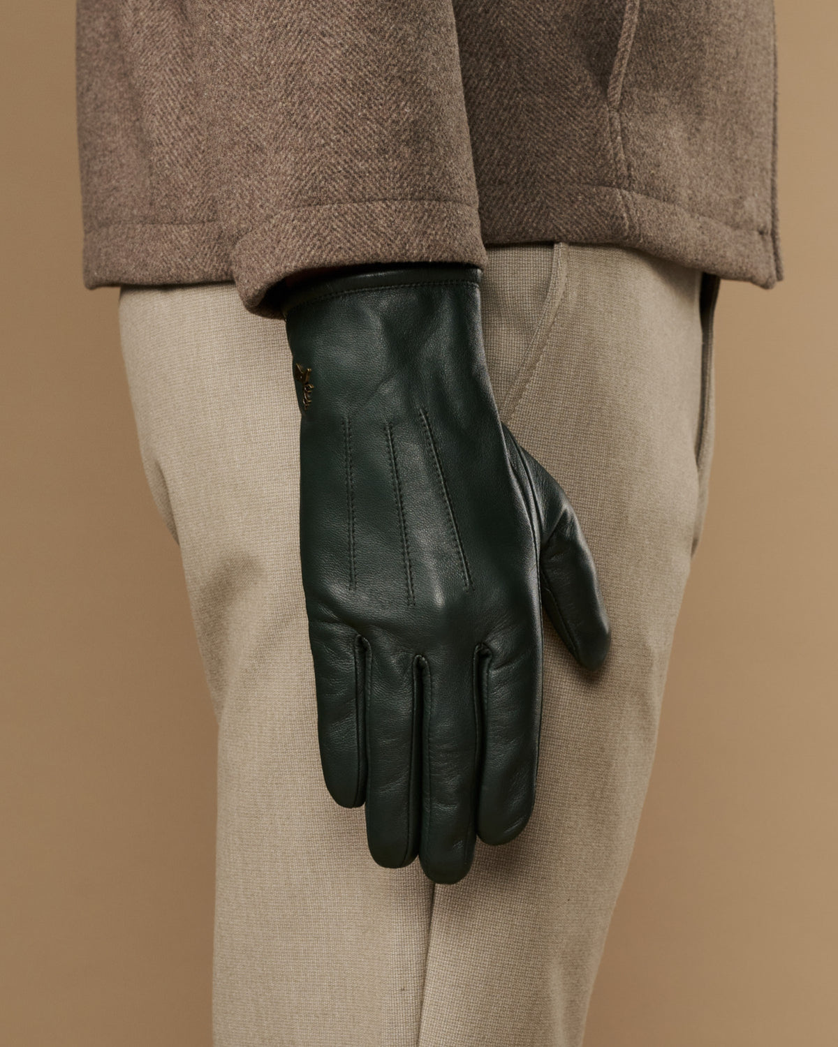 Dark green Jake sheepskin gloves with warm fleece lining, cuff and palm view