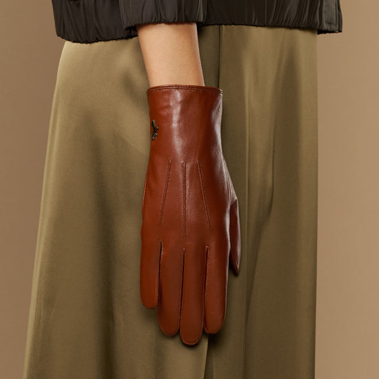 Women’s cognac leather gloves with long fur-lined cuffs and stitched finger panels