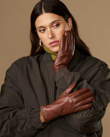Cognac brown leather gloves with warm fleece lining, stitched seams, long cuff