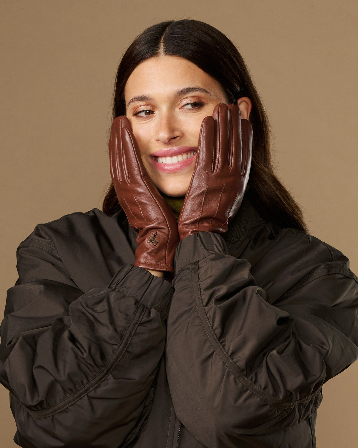 Cognac brown leather gloves with warm fleece lining, long cuffs, smooth finish