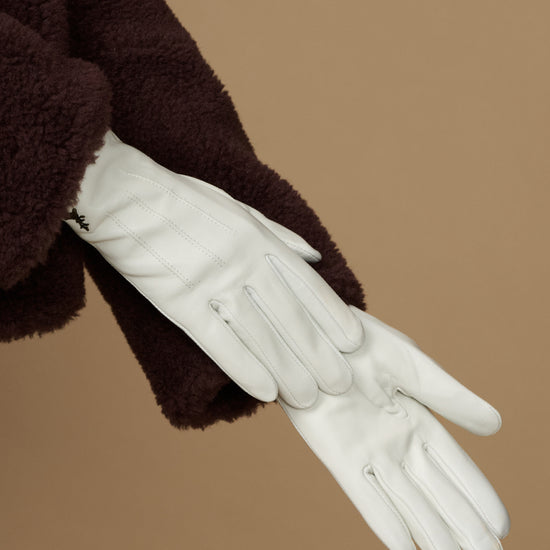 White sheepskin leather gloves with fleece lining, long cuff and stitched fingers