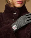 Women's herringbone tweed glove with sewn panel and leather palm, black trim
