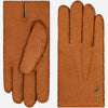 Pair of cognac brown men’s peccary leather gloves with stitched finger seams