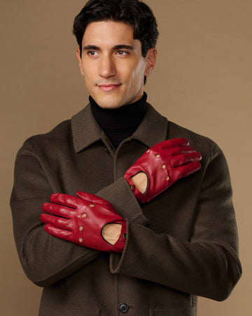 Men's red leather driving gloves with stitched fingers and open thumb panel