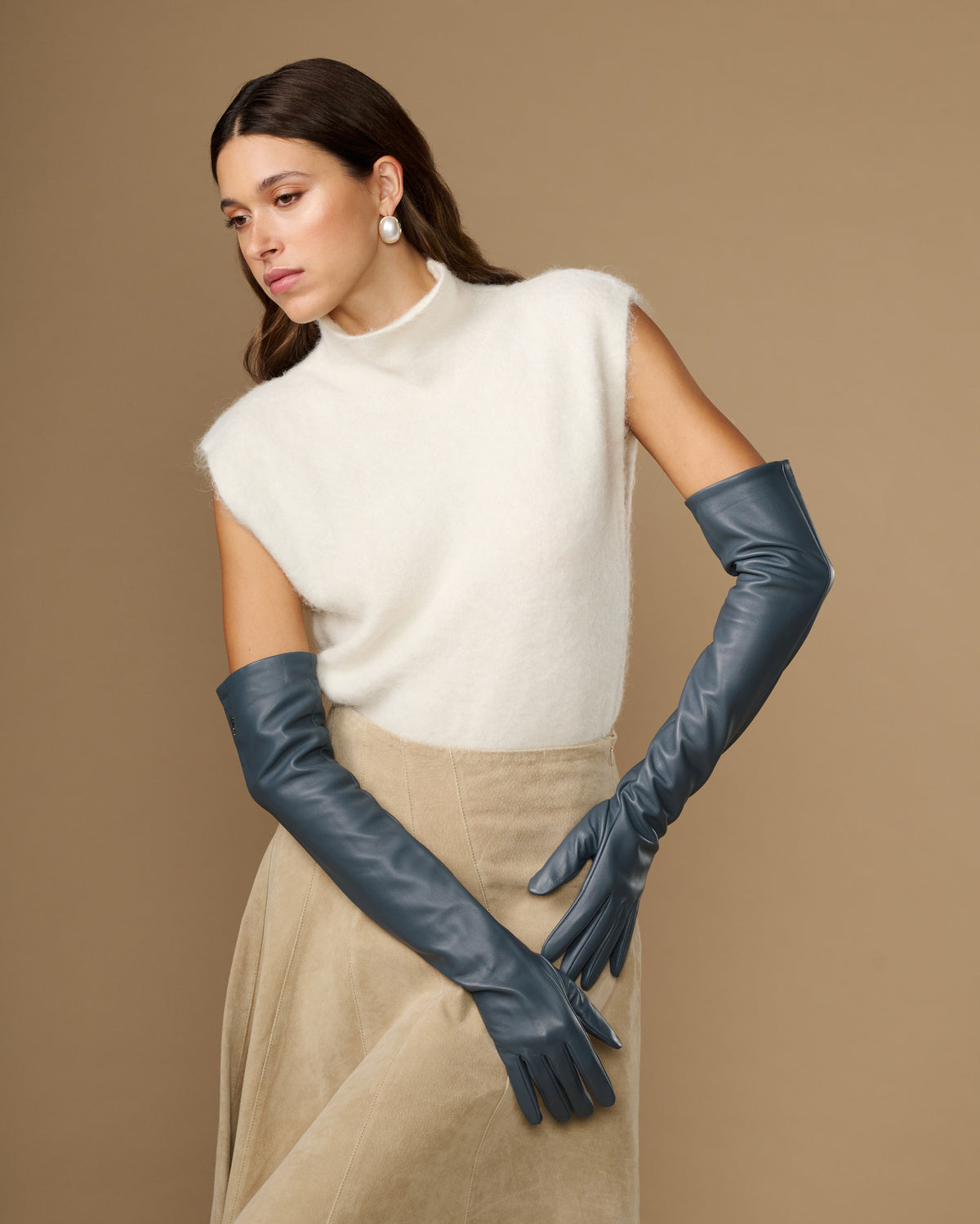 Women's grey lambskin leather gloves with silk lining and touchscreen fingertips, paired