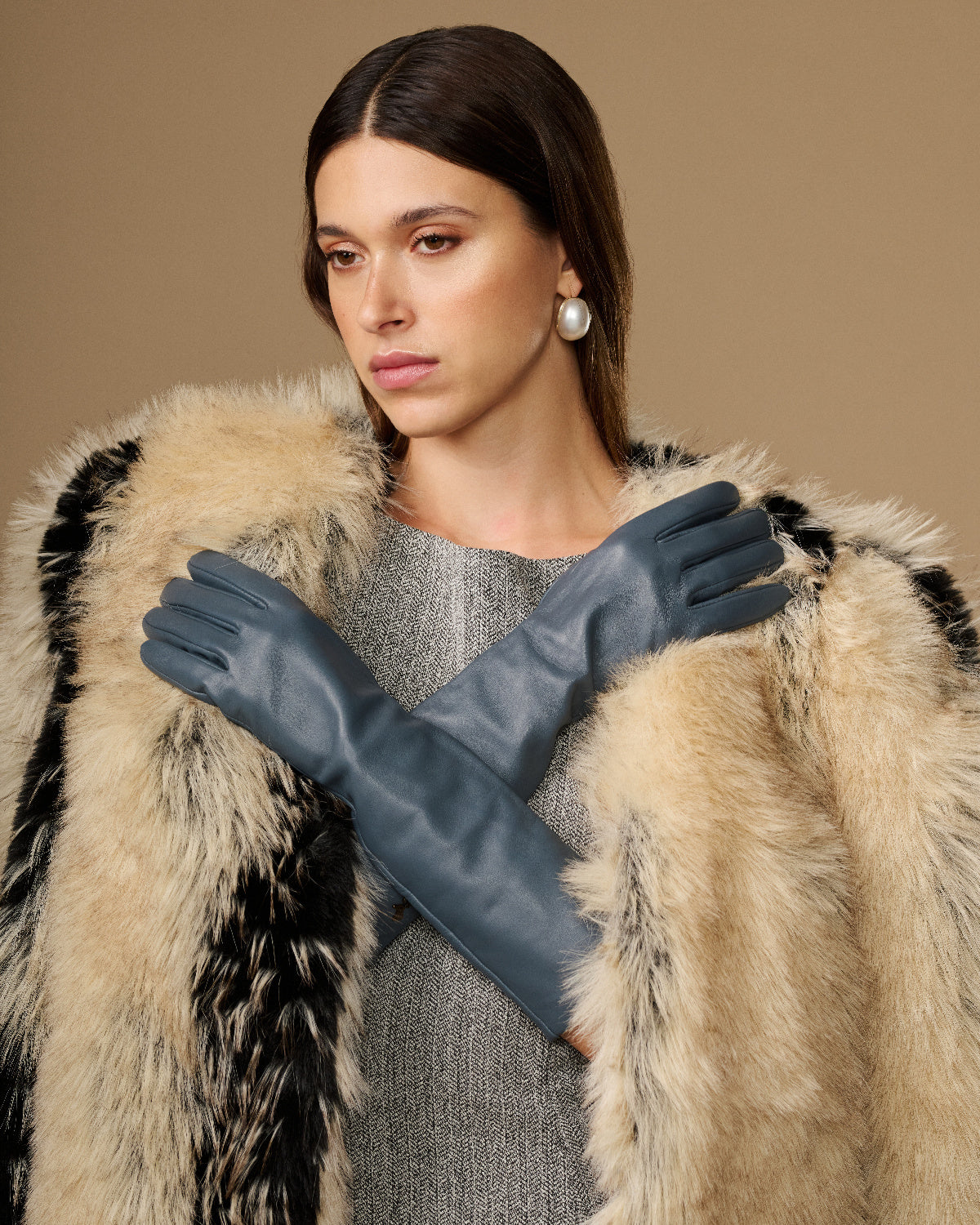 Women’s grey below-elbow leather gloves shown from the front, smooth leather