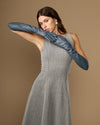 Dark blue leather glove with extended cuff, model hand pose