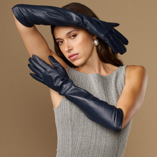 Women's blue leather elbow gloves with long cuff and glossy finish