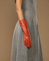 Rosemary Mid-forearm (oranje) - Dameshandschoenen van lamsleer met zijden voering & touchscreenfunctie