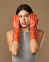 Rosemary Mid-forearm (oranje) - Dameshandschoenen van lamsleer met zijden voering & touchscreenfunctie