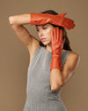 Rosemary Mid-forearm (oranje) - Dameshandschoenen van lamsleer met zijden voering & touchscreenfunctie