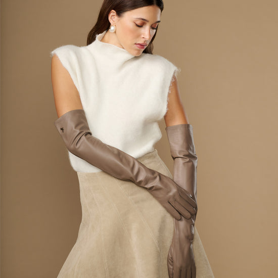 Taupe lambskin leather gloves with long cuffs, hand-to-waist styling