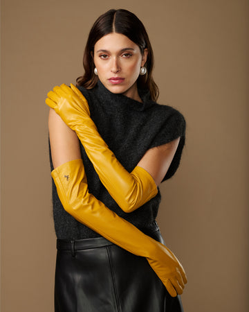 Yellow lambskin leather opera gloves with silk lining, long fitted style